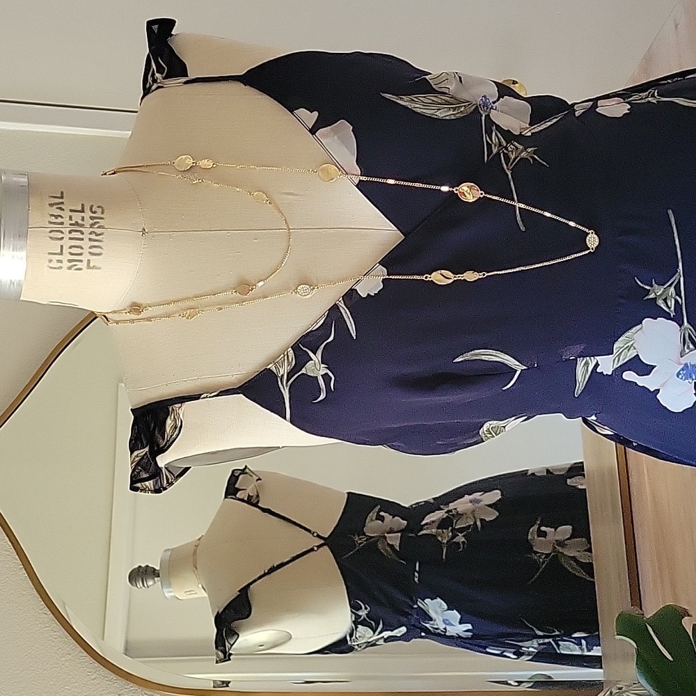 A beautiful wrap LULUS chiffon dress in midnight blue.
